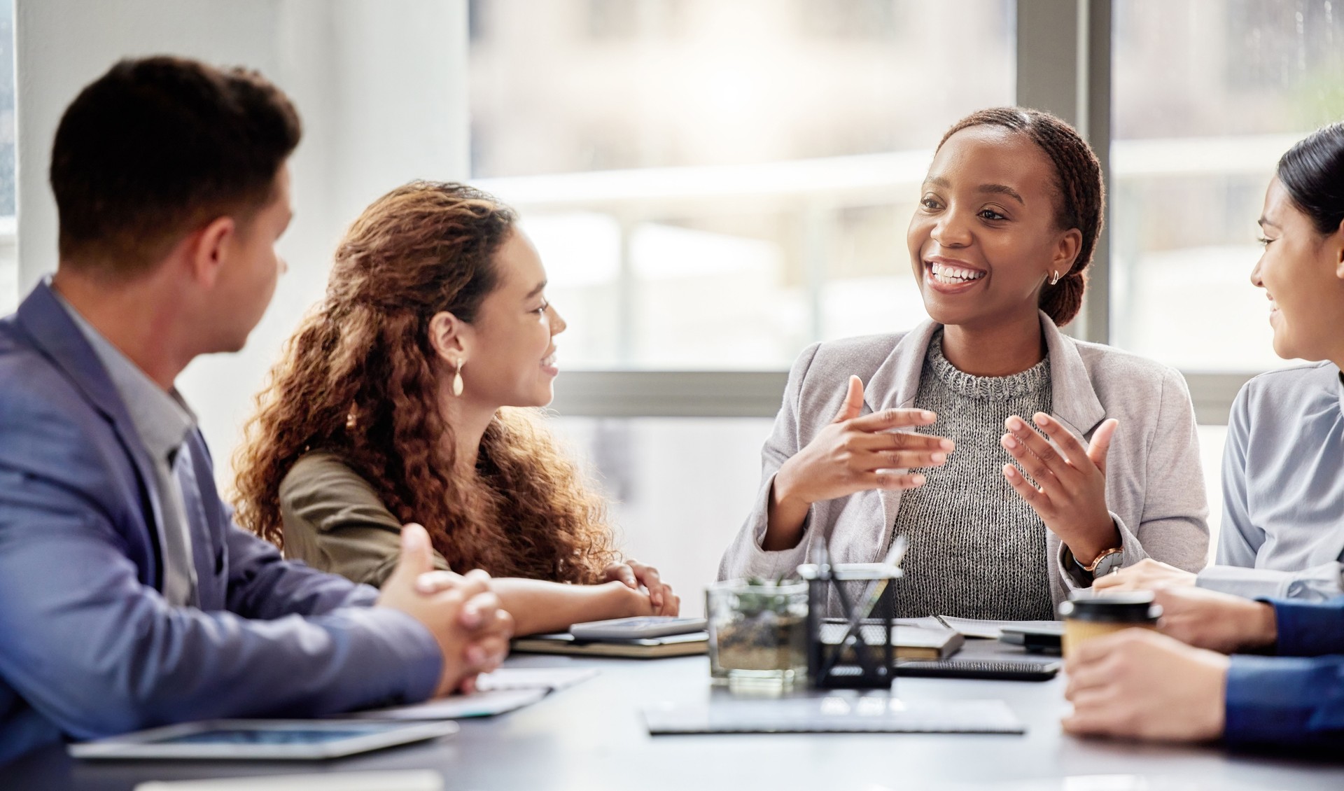 Shot of a group of colleagues having a meeting in a boardroom at work