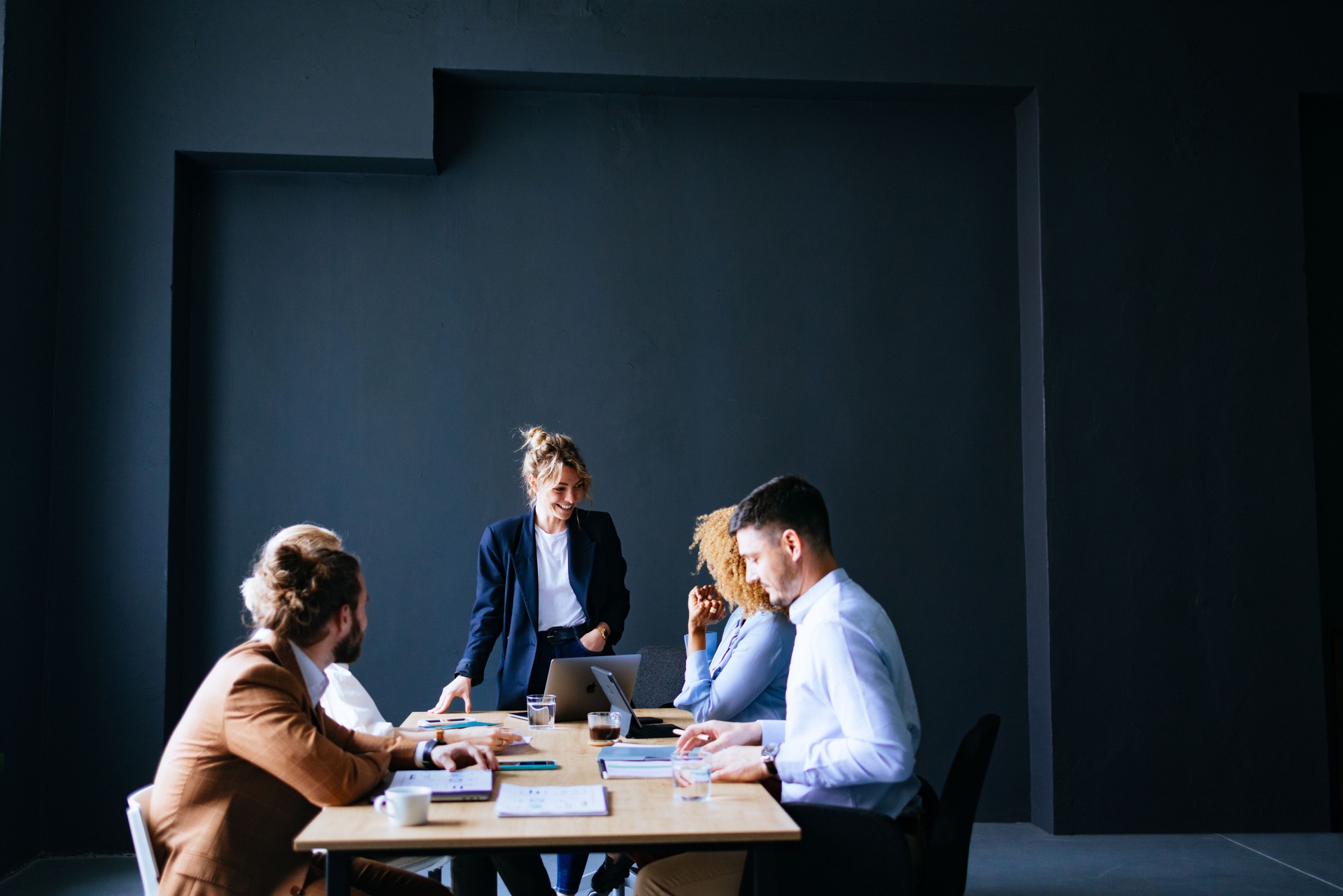 Group Of Happy Businesspeople On A Meeting At Their Company