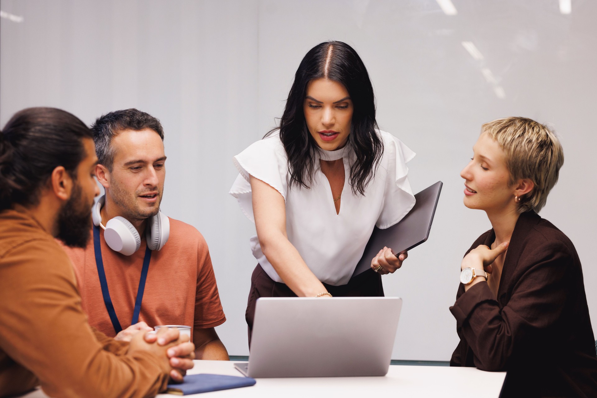 Aboriginal Australian woman leading a meeting of co-workers